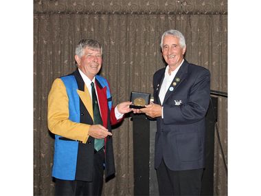 ACA President Neil White presents the Gold Medal to John van der Touw
