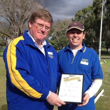 BMSC's new life member
Chris Langford (left) accepts a certificate of Life Membership of Brunswick Mallet Sports Club from Tim Stagg, current BMSC secretary. Chris was secretary of the club for 16 years, enabling it to survive a difficult period. He led the introduction of gateball at Brunswick and played in two international competitions representing Australia at gateball; he also competed in AC and played GC.
