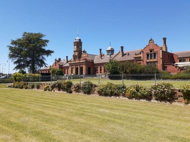 Maryborough VRI Croquet Club with Maryborough station in the background
