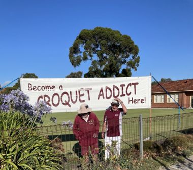 Don Batchelor and Barry Lovell setting up the banner.
