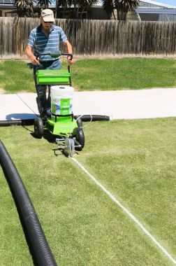 Collin Woodall marking lines.
